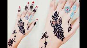 Premium Photo  Young girl make a temporary tattoo of mehendi from henna on  hand