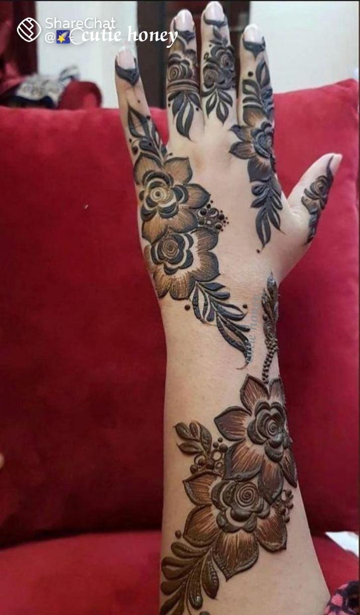 back hand rose  mehndi design Images • cutie honey (@tie786) on ...