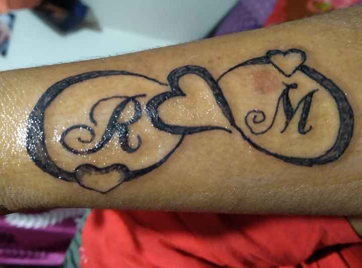 Tattoo of MK heartigram Love bond tattoo  custom tattoo designs on  TattooTribescom