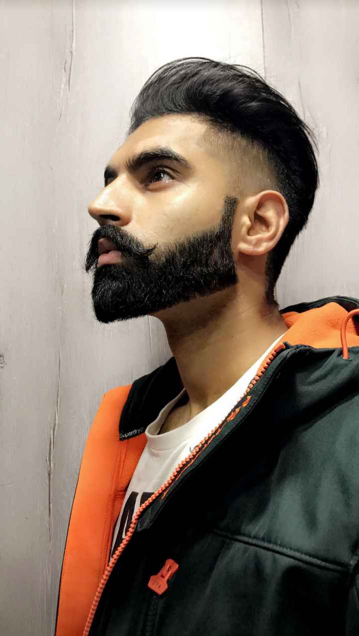 Download Parmish Verma In Blue And White Stripes Wallpaper | Wallpapers.com